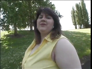Obese brunette ma'am searches for then fingers her clit on the couch
