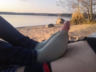public footjob and socksjob on the beach