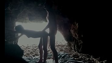 Couple recorded at the beach, inside the cave