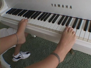Pretty blonde licks his cum off her cute feet