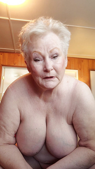 Nasty Granny Showing Off Her Fat Pussy As She Rubs It With A Dildo