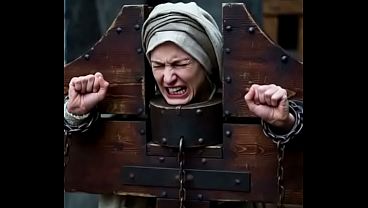 Dungeons in medieval times woman getting chained up in bondage