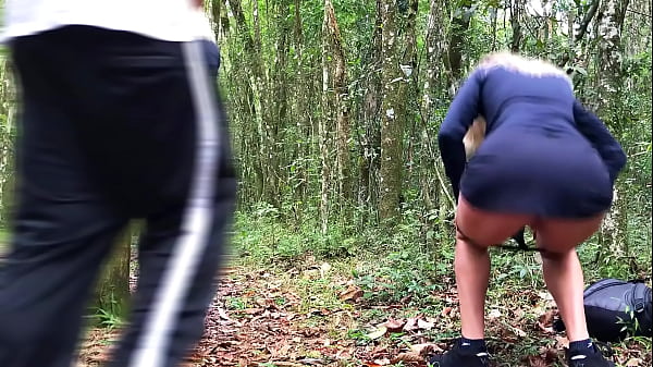 A passerby roughly fucked a milf peeing in the bushes.