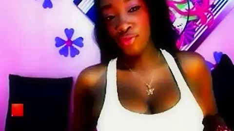 Gorgeous Ebony chick flashing her big boobs on camera