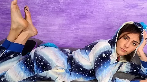 Stunning Aradia In A One-Piece Hooded Pajama And Purple Slippers - VRFootFetish