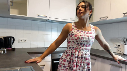 Hot Brunette Bored Wife in a Mini Modified Sun Dress to Flash her Tight Shaved Pussy in the Kitchen