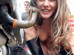 Busty MILF in Red Boots Sucks Truck Pipe in Public