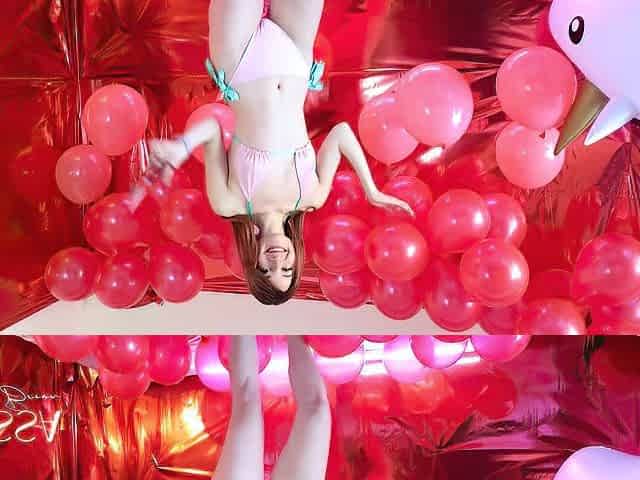 Slender redhead has joy popping balloons with her butt, until her twat is soaked