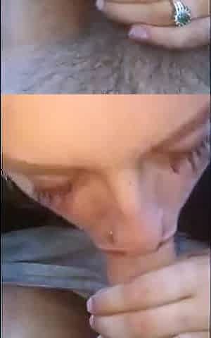 Pierced Brunette Blows in the Car