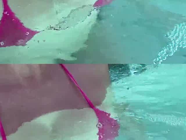 Artemisia Love Showing Her Consummate Breasts in a Micro Bikini Underwater