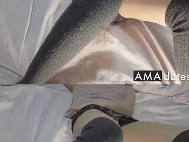Asian babe masturbates and sucks candy for orgasm.