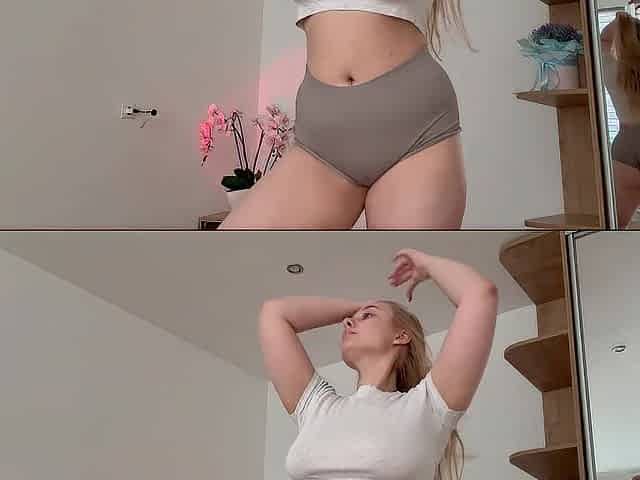 Curvy beauty trying on constricted shorts and showing off her view from behind