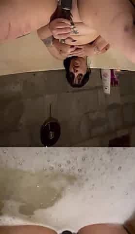 Kinky hotty alone in bathtub masturbates