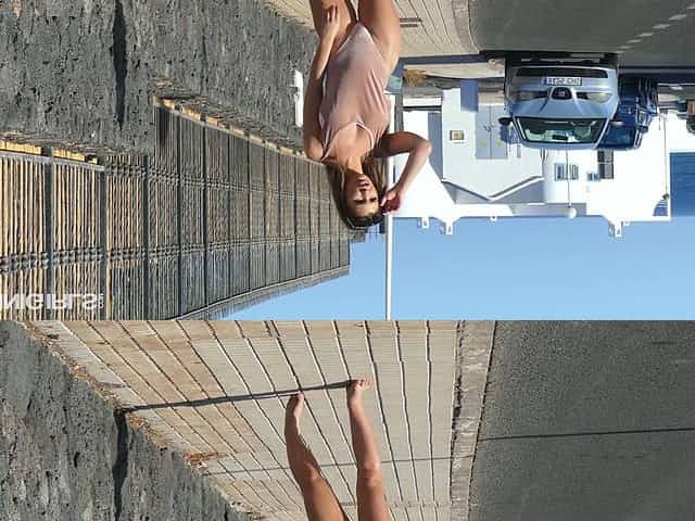Sexy busty bikini girl Katie Lou loves posing topless outdoors