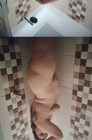 Aged Colombian woman masturbating in the shower