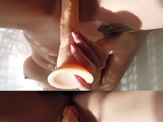 Big dildo close-up masturbation by a tattooed milf in public