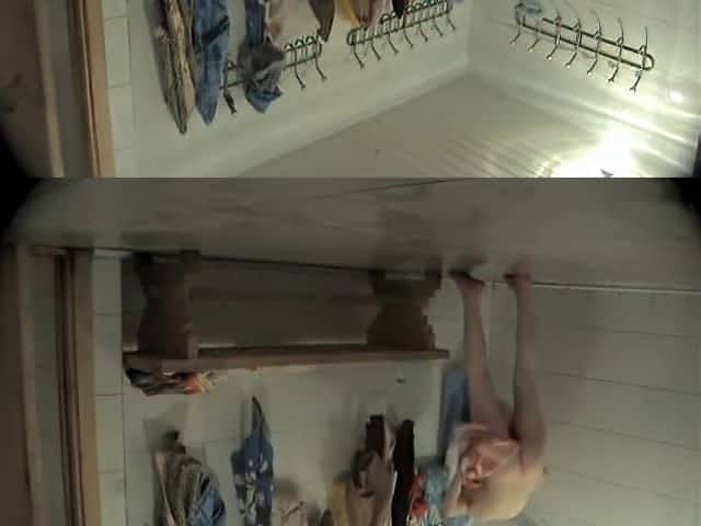 Girl gets naked in the dressing room and a spy cam films it