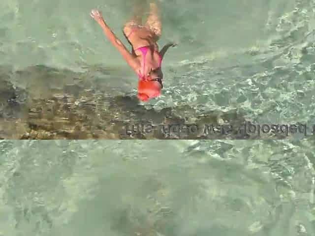 Pink bikini in a gorgeous bay