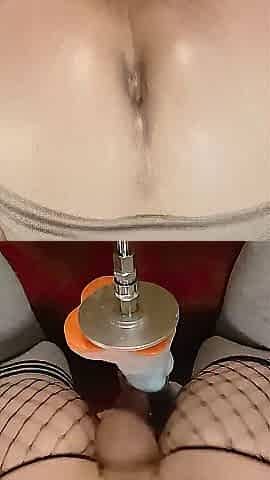 This femboy likes taking massive dildos on their bang machine