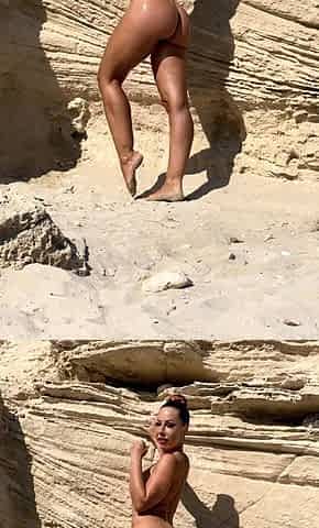 Chick masturbating outdoors on a beach