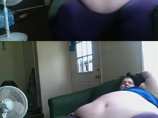 SSBBW - shows off large stomach