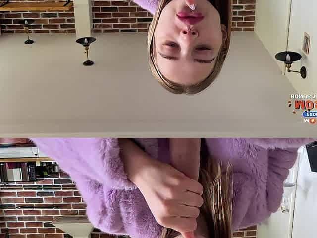 Hawt whore in purple furry coat loves cum on her beautiful face