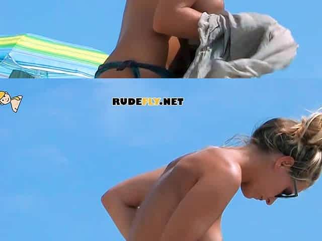 Playful nude beach girl caught on camera tanning