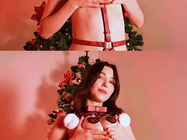 Mesmerizing sexy beauty craves to be your present and masturbates underneath the Christmas tree