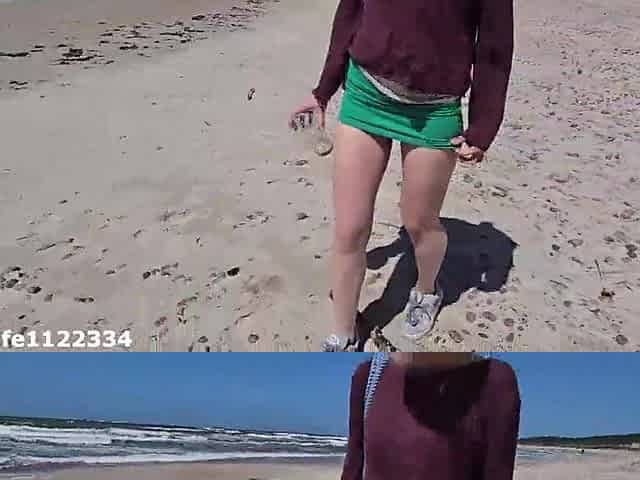 Playing with charming pink snatch on the beach