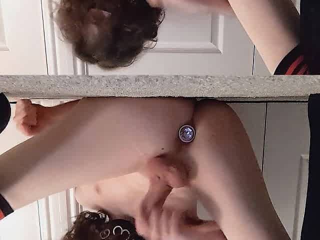 plugged femboy jerks off and cums all over themself