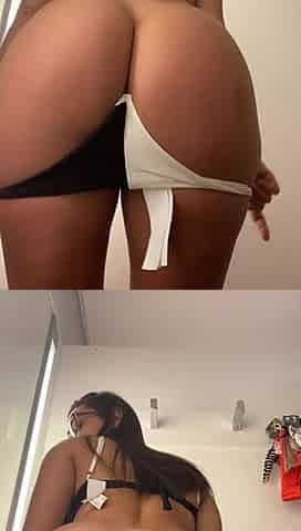 Hot Brunette with a Big Ass Trying on a Skirt Naked in the Fitting Room.