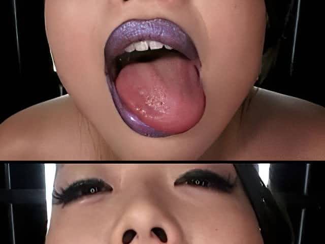 Beautiful Japanese babe with juicy lips poses on camera