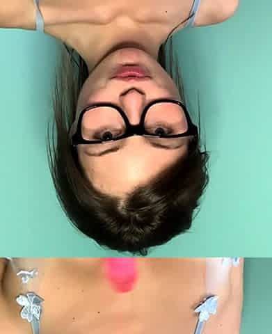 Busty babe playing with her big boobs