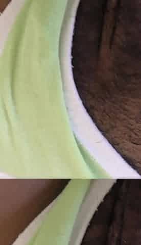 Close-up of a black hairy cunt filled with hot jizz