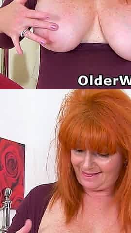 Redhead MILF Ginger Tiger Lowers Her Jeans and Spreads Her Legs Wide for Some Dildo Action