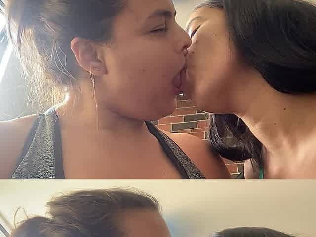 Lesbo kiss with tongue sucking close up