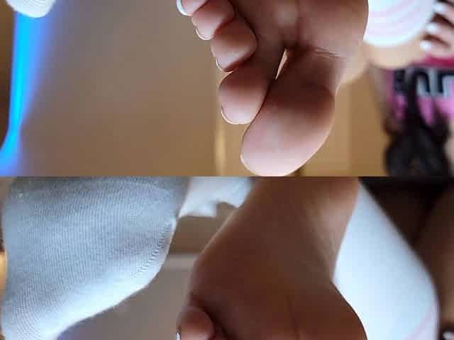 Brunette with foot fetish rubs big dick with her feet in POV