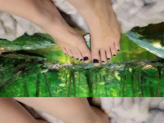 Massage oil on charming feet