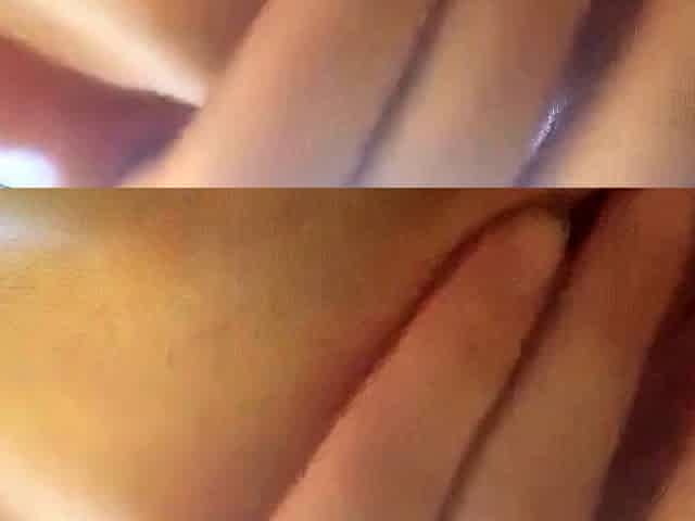 Brunette amateur fingers her pussy on camera.