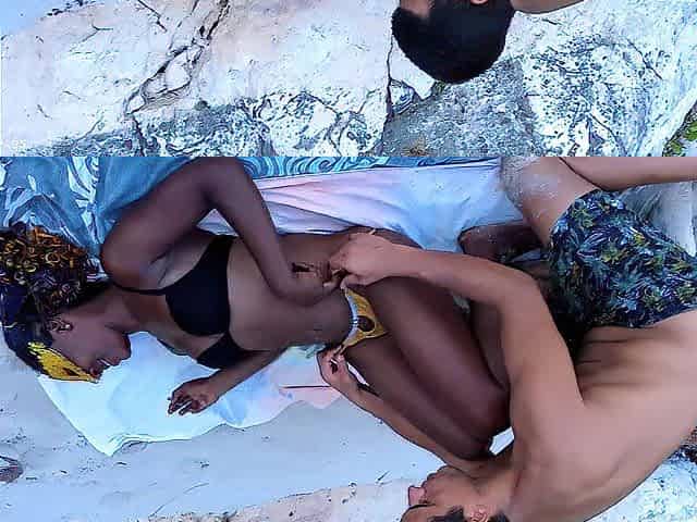 Wild sex on the beach for this kinky black