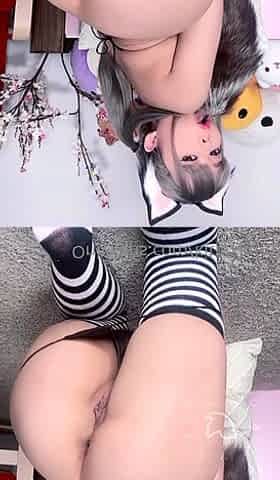 Asian teen plays with toys on webcam