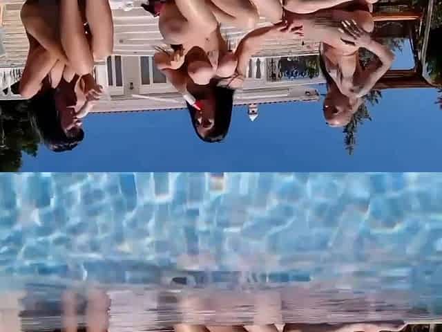 Hot lesbians having fun with toys by the pool