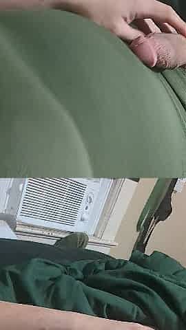 Wanking in a green costume and fake tits