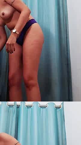 Real sex inside a store fitting room with ejaculation on the face.