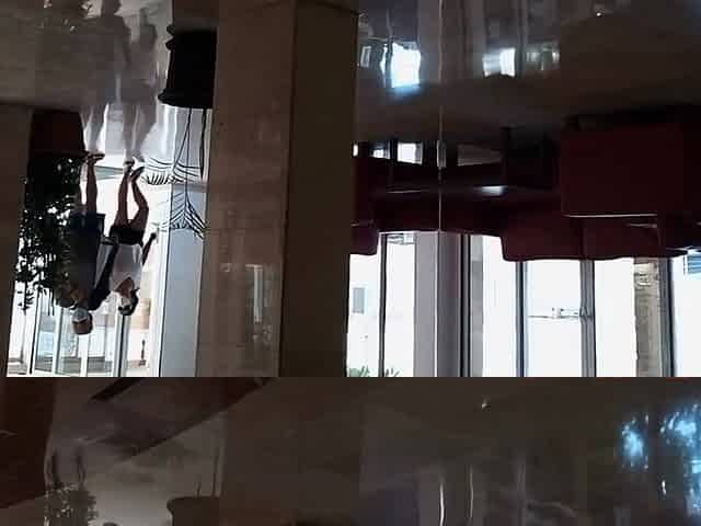 Public Nudity in a Hotel Lobby - No Panties Flash