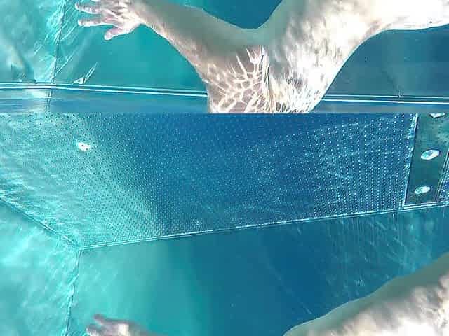 Bare teen with fantastic titties in a public pool makes petite jock hard