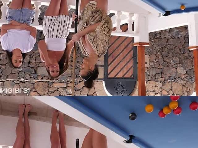 Tanned bikini girls are playing billiard topless