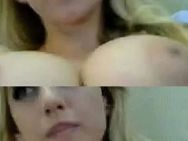 Oiled Blonde Amateur Rubs Her Big Tits