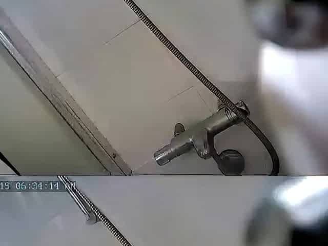 Asian milf spied while showering