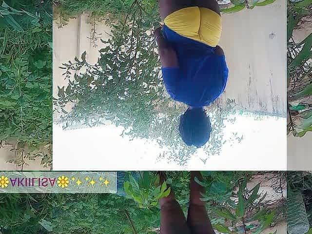 Afro gardener AKIILISA checking out the fruits of the season/lover's Tshirt and petite butt short/